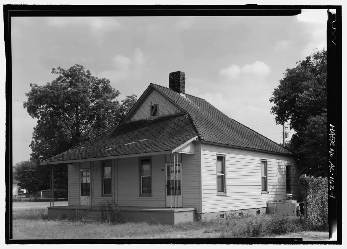 Mill-worker house in Huntsville, Alabama, with an original asbestos shingle roof laid in a diamond pattern.